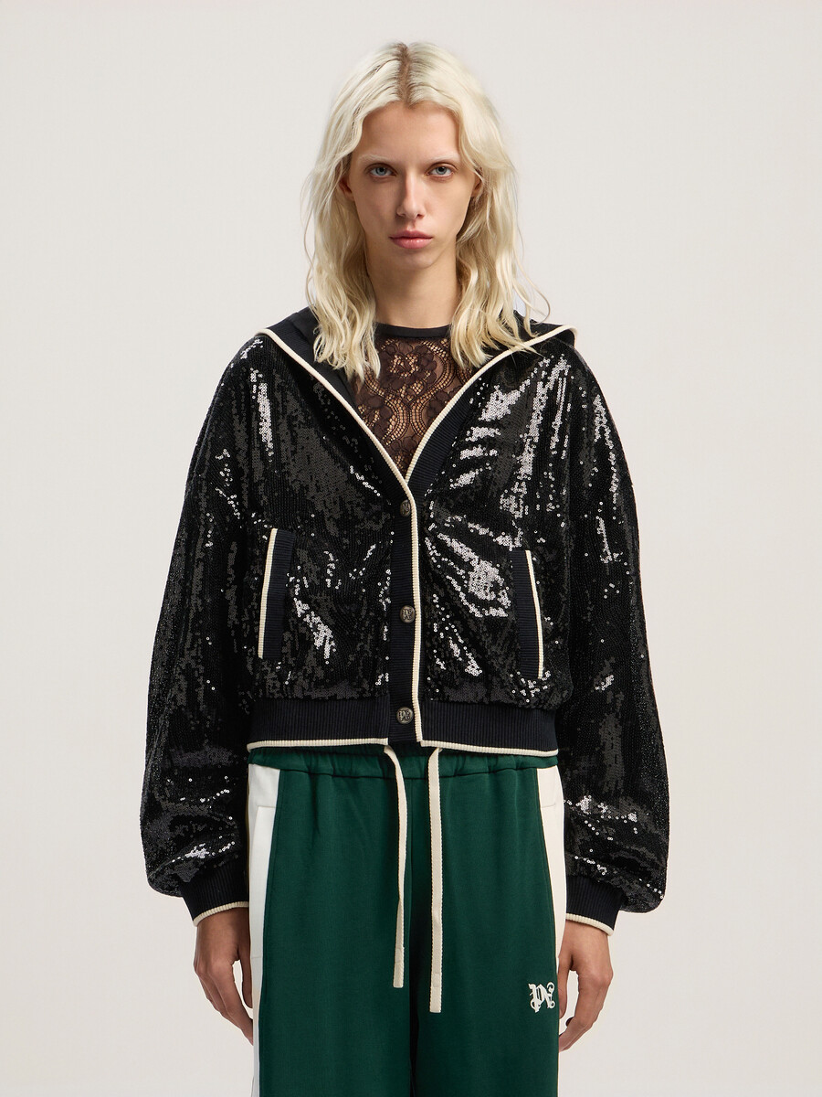 kurze jacke mit geschwungenem logo und pailletten