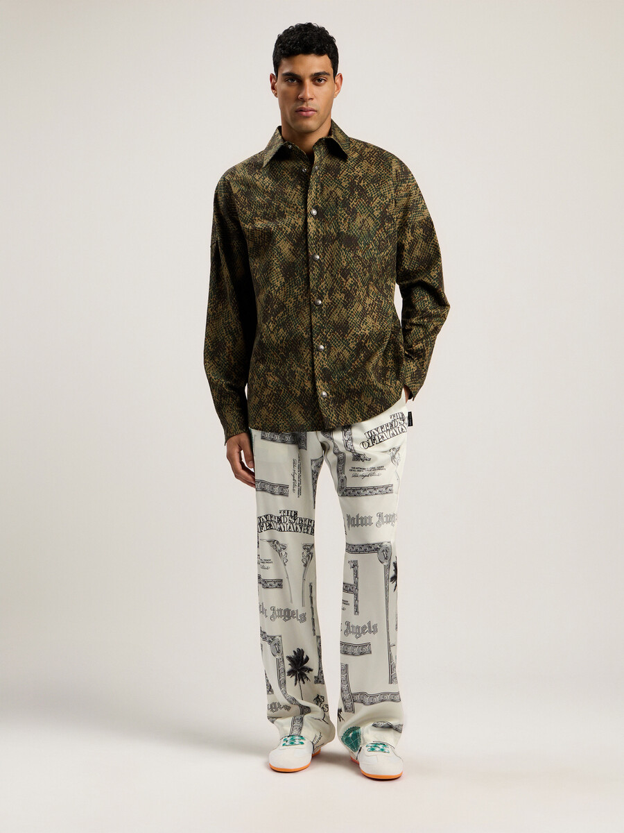 weite hose mit dollar-print