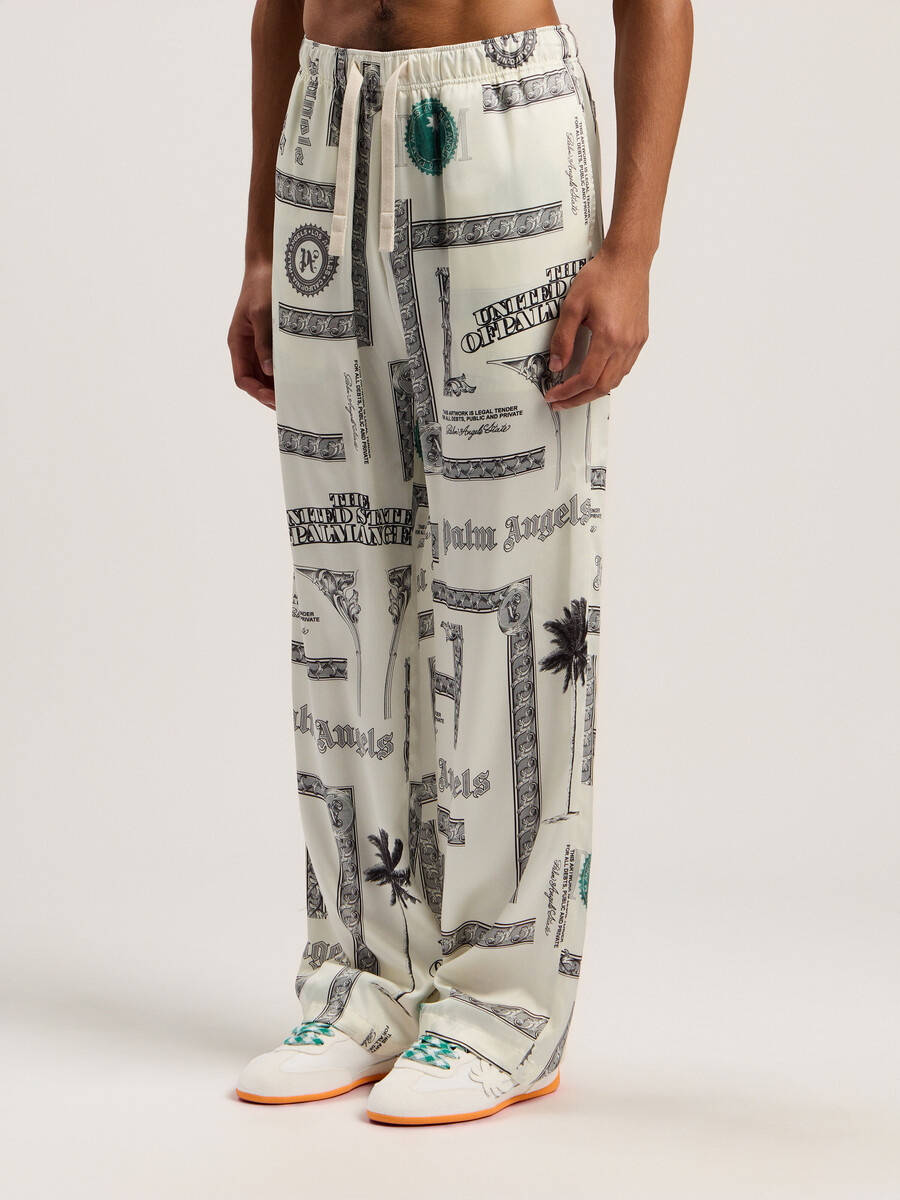 weite hose mit dollar-print